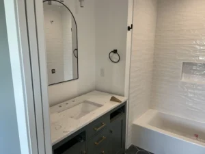 bathroom makeover with new vanity and tub scaled