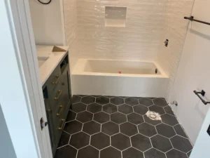 bathroom remodel with hexagon tile flooring scaled